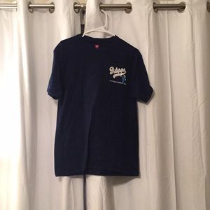 navy blue t-shirt, orange accents.